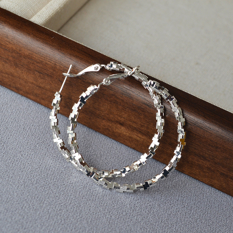 Sola irregular textured hoop earrings